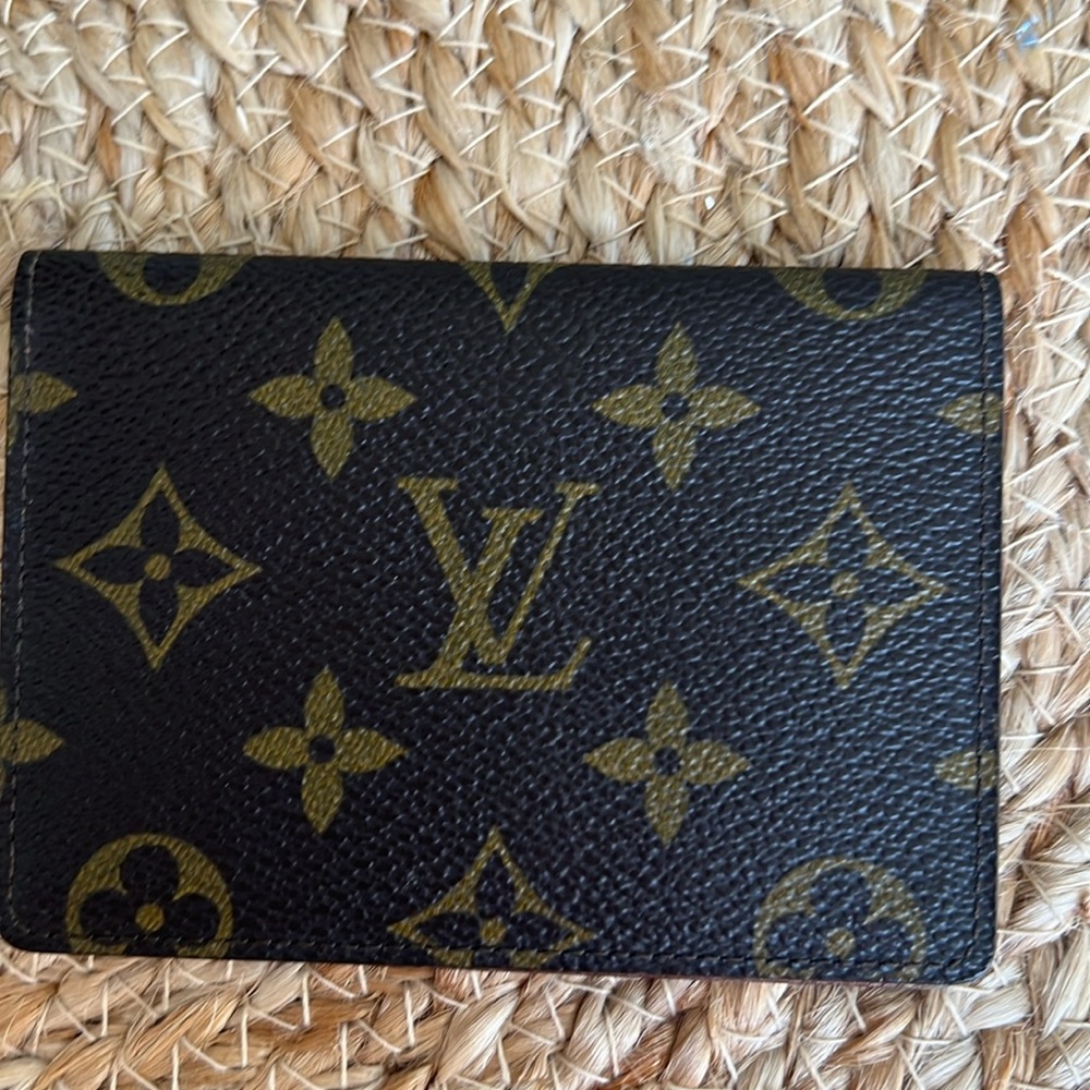 LV fold over cardholder bifold no cracks 41/2”Lx31/2”W plastic shows signs wear